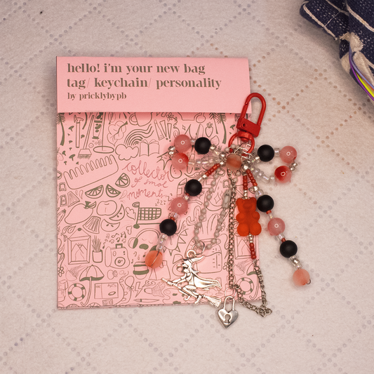 the red witch key/ bag chain