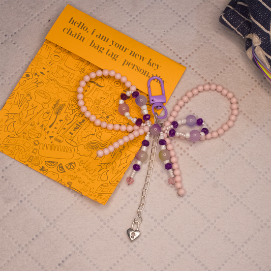 the pink lock key/ bag chain